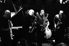 Lol Coxhill, Elton Dean, Evan Parker, Simon Picard; also John Edwards (lurking in the background with the double bass), Mark Sanders (not visible)